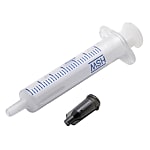 Nozzle/Syringe Cap for Dispensation